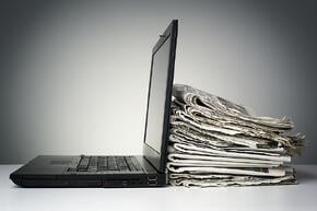 bigstock-Laptop-and-newspaper-concept-f-66698950